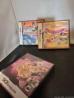 Three Nintendo DS game cases arranged on table