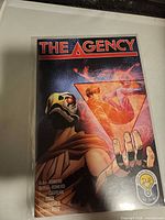 Front cover of The Agency comic book