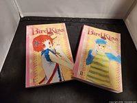 Front covers of Bird Kiss volumes 1 and 2