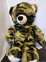 Front view of Build-A-Bear camouflage plush teddy bear