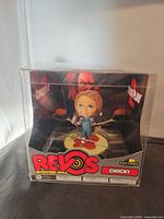 Front view of sealed Chucky Revos figure box