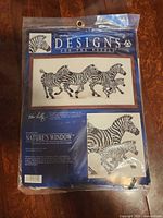 Front of sealed Designs for the Needle Zebra kit