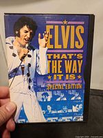Front cover of DVD case showing title and Elvis image