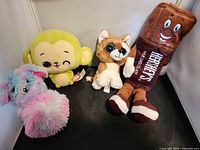 Group shot of all four plush toys