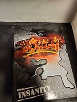 Closed Insanity workout case front cover