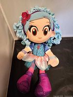 Full view of Luna Petunia plush doll