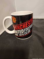 Front view showing full text and crest