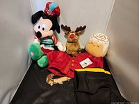 All three plush toys and RCMP outfit displayed