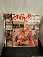 Front of puzzle box showing Oliver! graphics and specifications