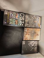 All four PC game cases laid out