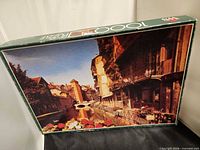 Front of puzzle box showing Annecy, France image and 1000-piece marking