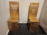 Both metal throne chair candle holders front view