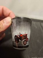 Front view showing red tractor graphic