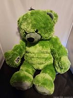 Front view of green Hulk Build-A-Bear plush seating