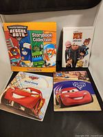 All four books front covers visible