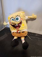 Full view of TY SpongeBob SquarePants mini plush front, arms outstretched
