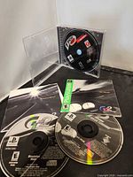 All three PlayStation game discs and manual
