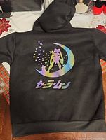 Whole hoodie back showing Sailor Moon holographic graphic