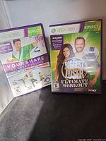 Front view of both Xbox 360 Kinect fitness game cases