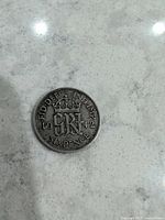 Reverse side showing crowned monogram, date 1942 and denomination