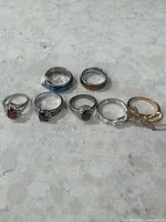 All eight rings laid out showing overall variety