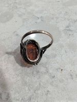 Ring viewed from underside showing sterling silver band and bezel