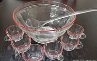 entire punch set showing bowl, ladle and six cups