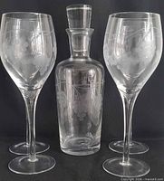 Full set showing decanter and four goblets