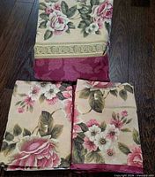 Folded duvet cover and two pillow shams displayed