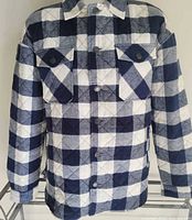 Front view of quilted flannel jacket on mannequin