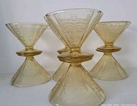 Group of amber Madrid footed dessert bowls front view
