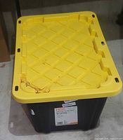Tote with closed yellow lid showing overall appearance