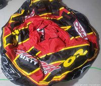 Top view of deflated Zipper 62 Pro tube showing overall graphics and canvas cover