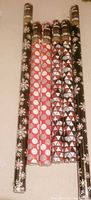 Six rolls showing three distinct patterns laid side by side