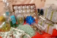 Group shot of all ornaments, garlands, gift boxes and tinsel tree