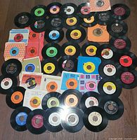 All singles and sleeves arranged on floor