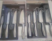 Front view of two sealed Prime Chef 4-piece knife sets in packaging