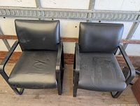 Front view of both bonded leather chairs