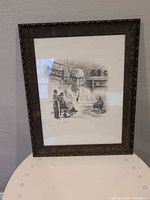 Full view of framed Coca-Cola advertisement print