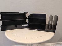 Both steel organizer units on tabletop showing overall configuration