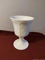 Full view of milk glass pedestal vase