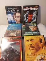 Six DVD cases front covers visible