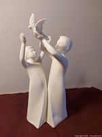 Front view of Royal Doulton Gift of Freedom figurine