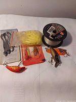 Overview of all tackle items including lures, soft plastics and line spool