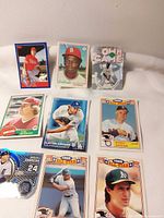 Overview of nine trading cards laid out