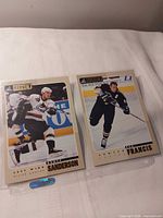 Both 5x7 cards Sanderson and Francis in binder sleeve