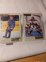 Front view of both cards in sleeve