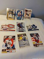 All nine cards laid out on bed