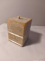 Full view of square pillar candle showing overall shape and size