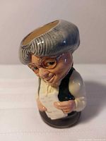 Front view of Royal Doulton School Mistress jug